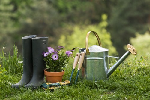 Gardening team assessing site hazards and equipment conditions